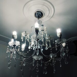 silver and white uplight chandelier